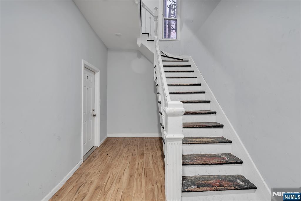 90 Park Avenue Paterson, NJ 07501 - Photo 5 of 42 a view of entryway with wooden floor