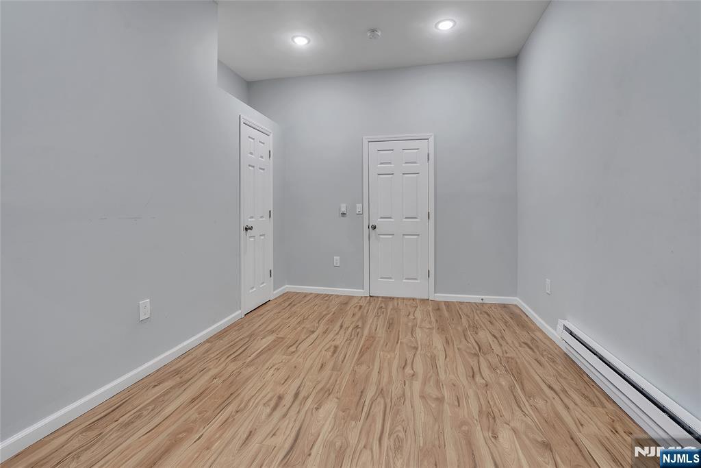 90 Park Avenue Paterson, NJ 07501 - Photo 7 of 42 a view of room with wooden floor