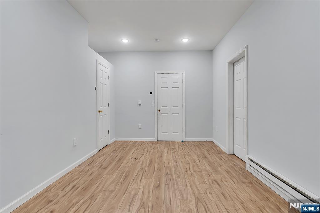 90 Park Avenue Paterson, NJ 07501 - Photo 9 of 42 a view of room with wooden floor