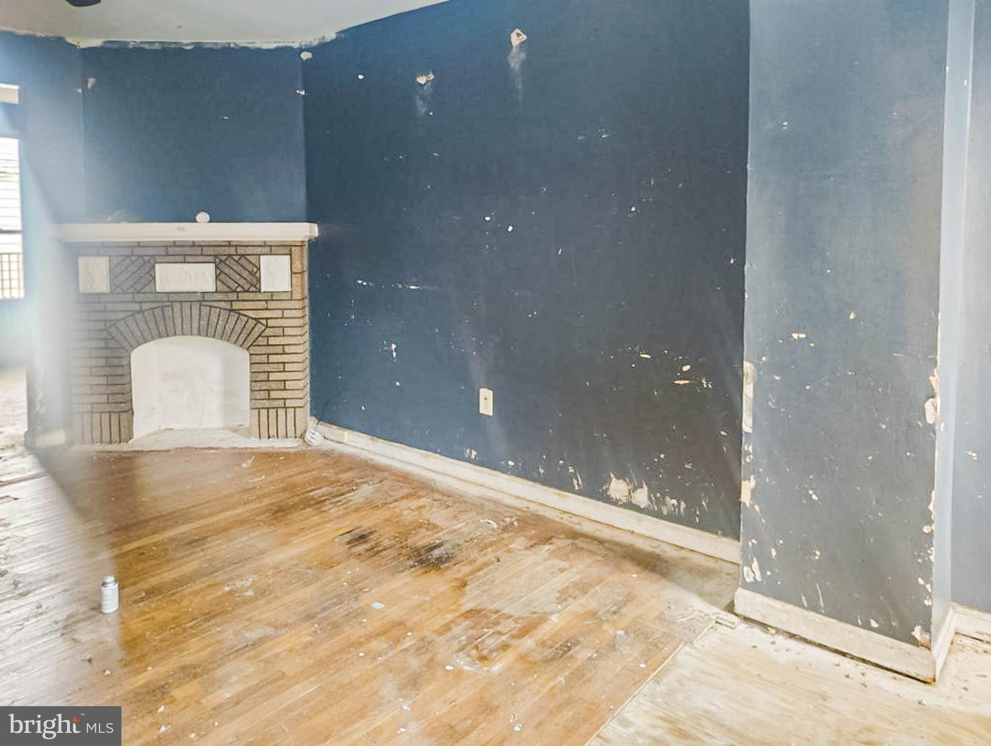 619 Brill Street Philadelphia, PA 19120 - Photo 4 of 18 a view of a livingroom with a hall and yard