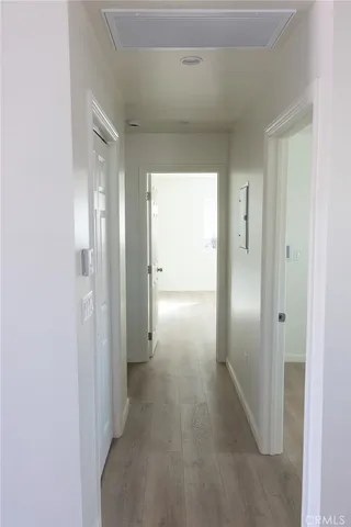 a bathroom with a sink a vanity and a mirror