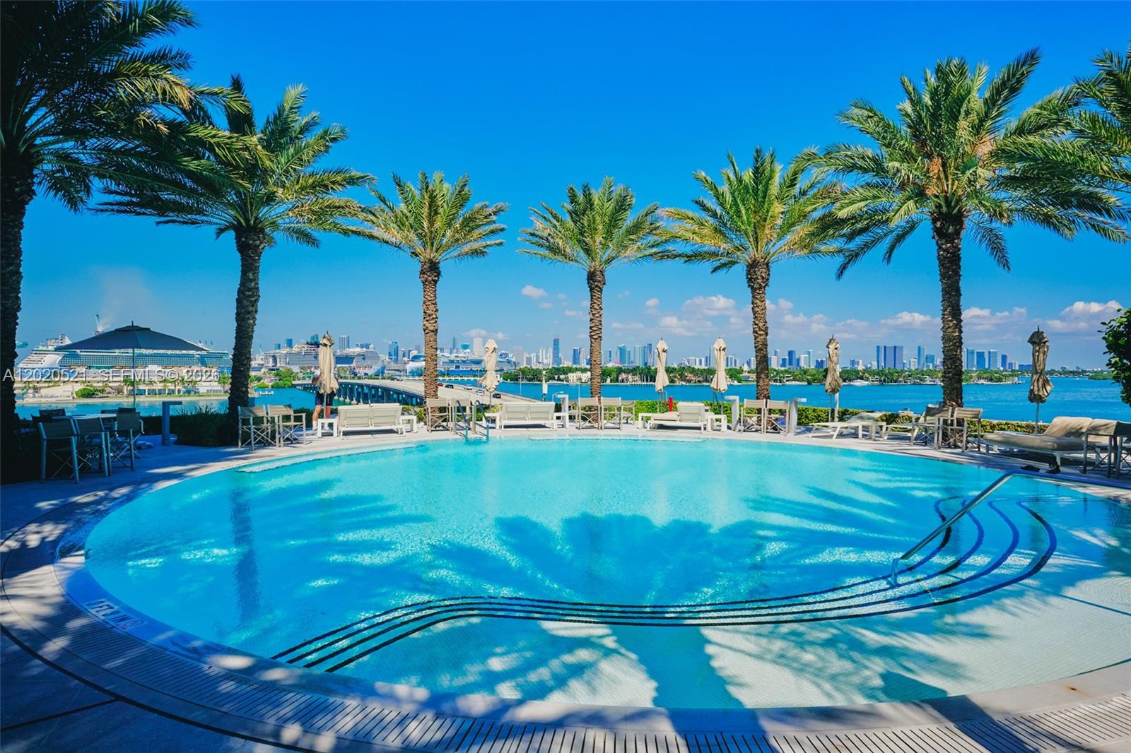 450 Alton Road, Unit 2810 Miami Beach, FL 33139 - Photo 27 of 29 a view of swimming pool with outdoor seating