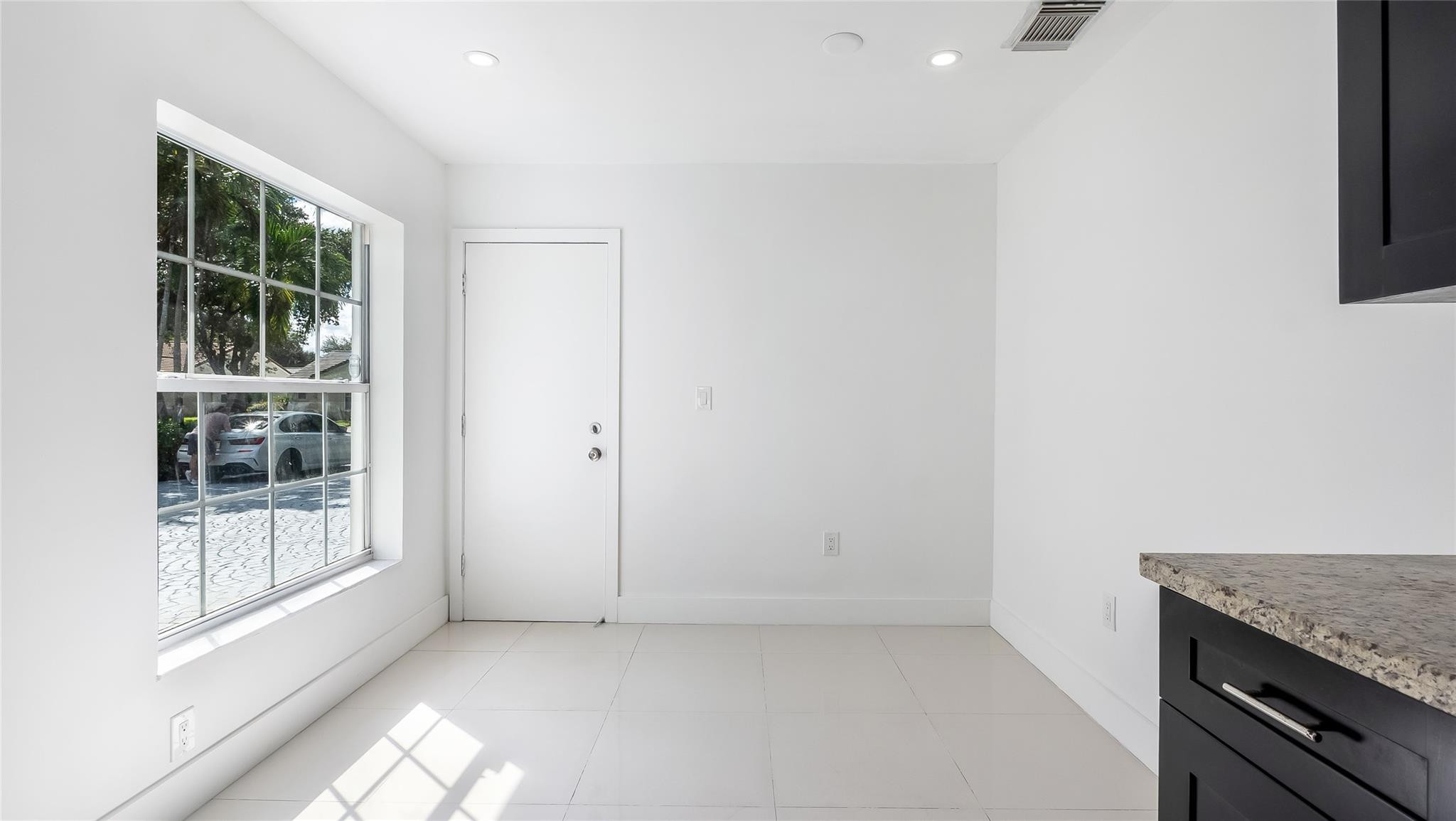 1811 Southwest 124th Way Miramar, FL 33027 - Photo 11 of 28 an empty room with windows