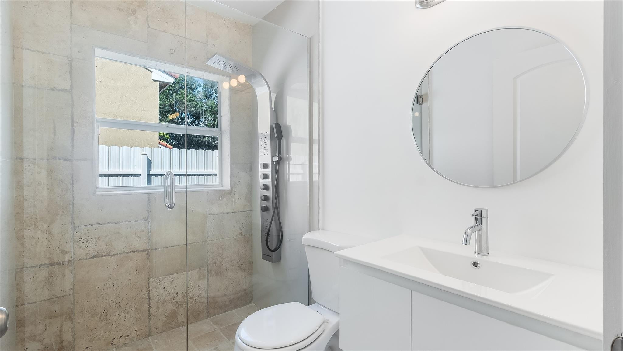 1811 Southwest 124th Way Miramar, FL 33027 - Photo 15 of 28 a bathroom with a sink toilet and shower