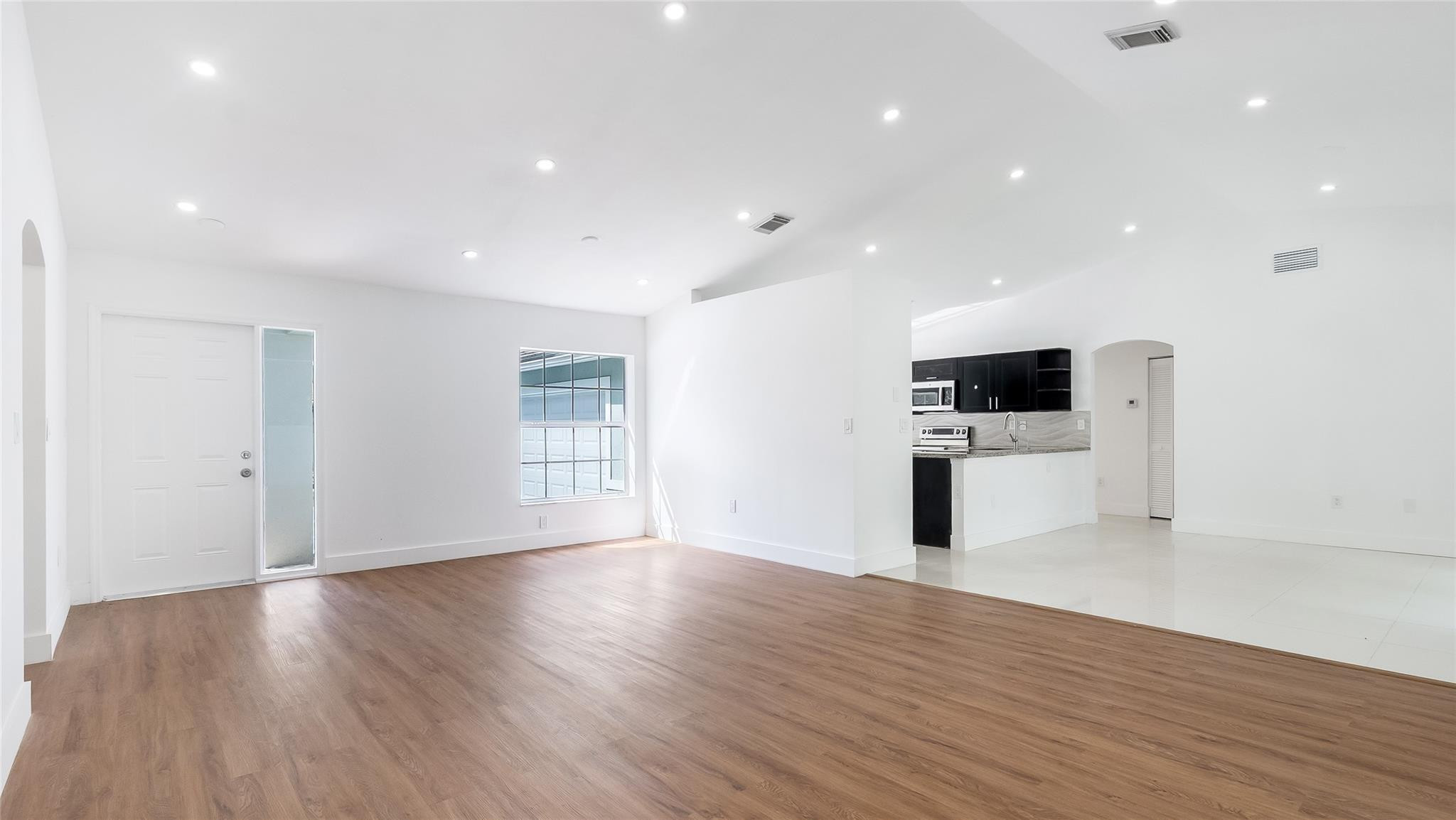 1811 Southwest 124th Way Miramar, FL 33027 - Photo 4 of 28 a view of kitchen with microwave and refrigerator