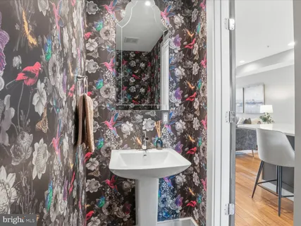 a bathroom with a shower and a toilet