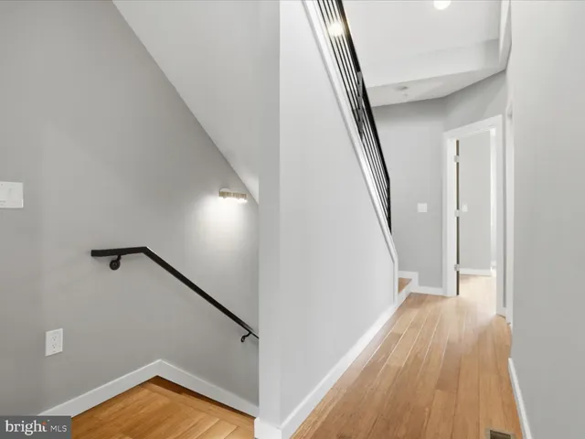 a bathroom with a sink a toilet and vanity