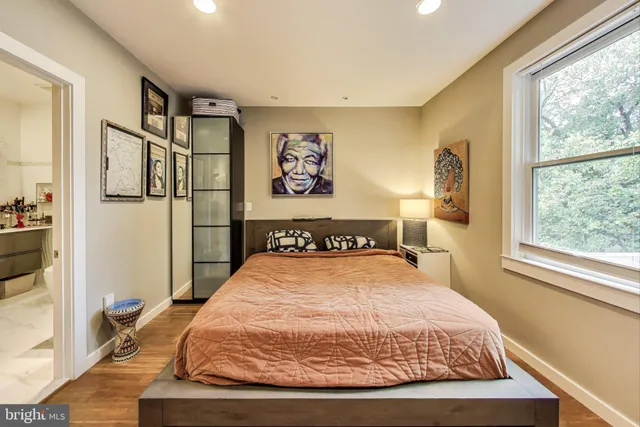 a living room with bookshelf and a book shelf