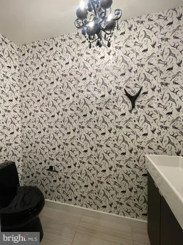 a bathroom with a sink and a toilet