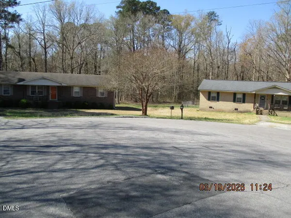 a view of street with houses
