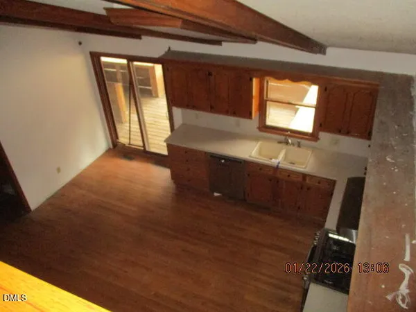 a living room with a fireplace furniture and a flat screen tv