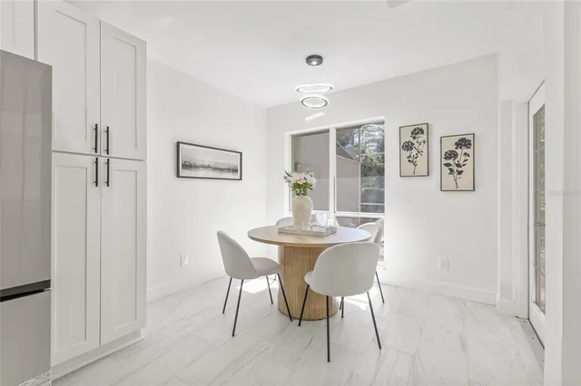 a view of a dining room with furniture