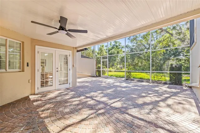 a view of a livingroom with a swimming pool