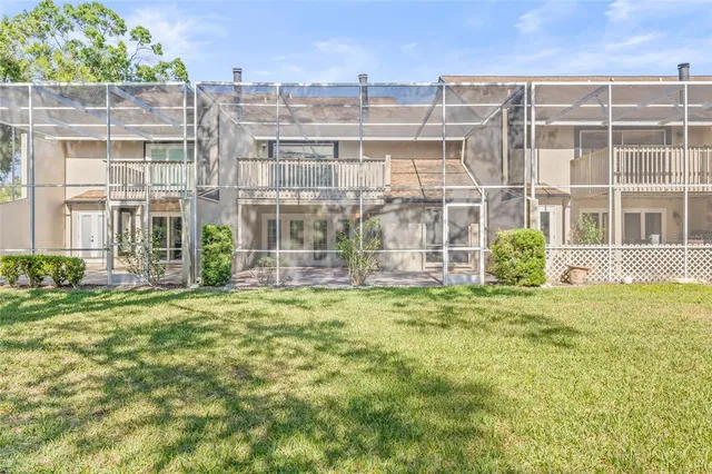 front view of a building with a garden