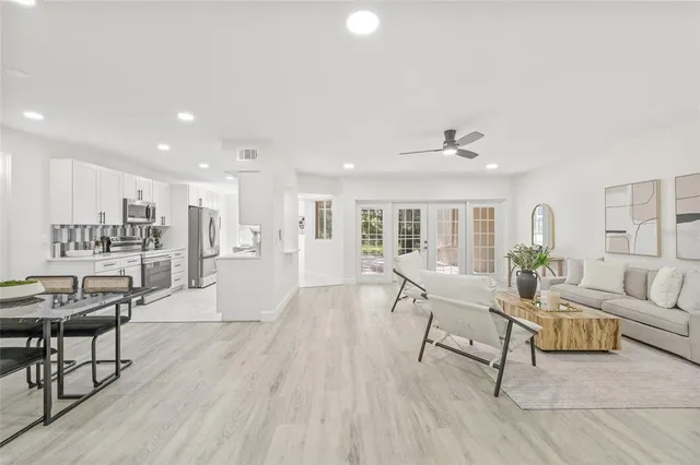 a living room with furniture and a table