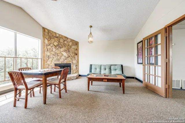 a dining room with furniture window and a livingroom