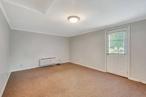an empty room with a workbench