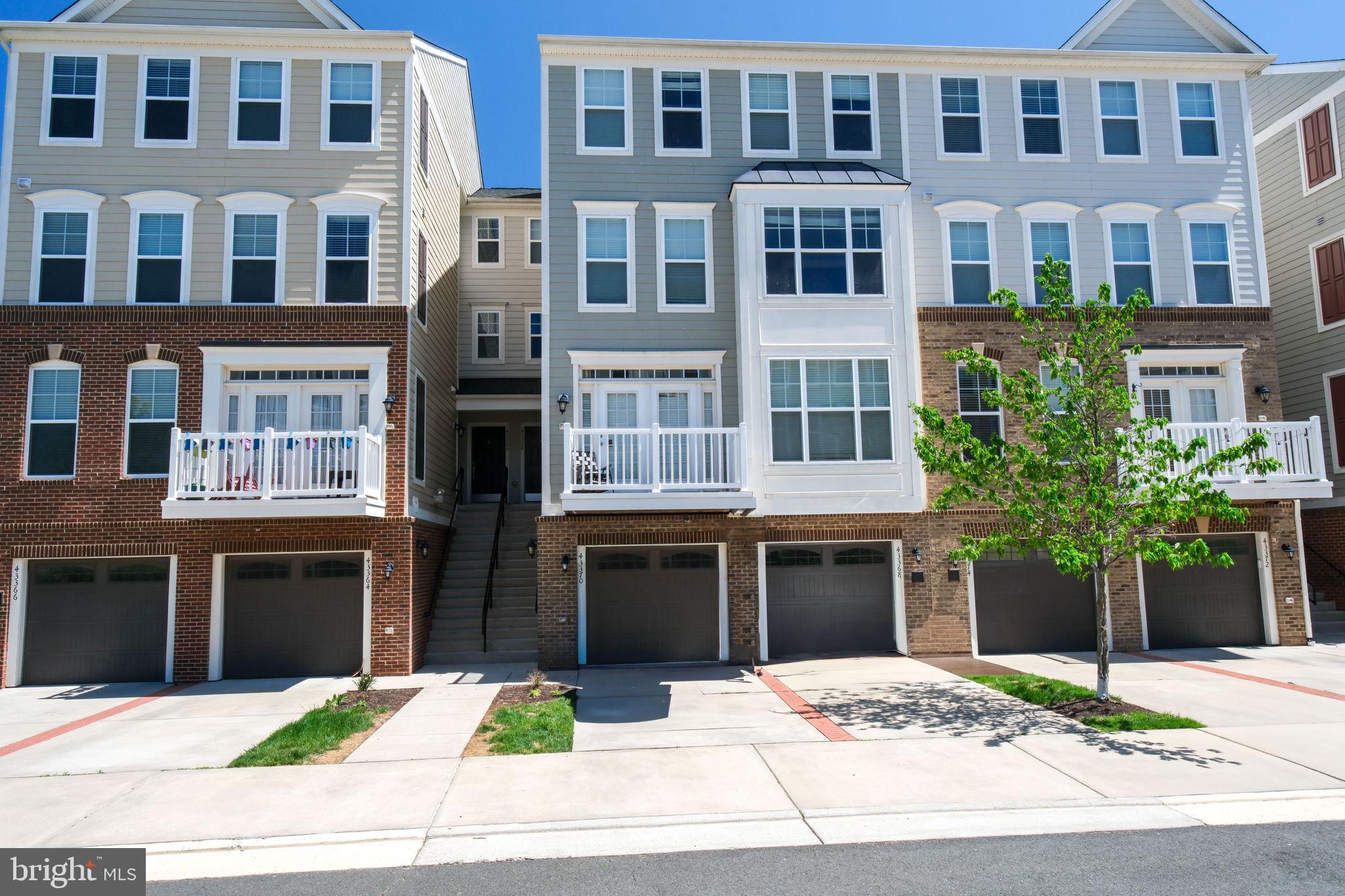 a building that has a tree in front of it