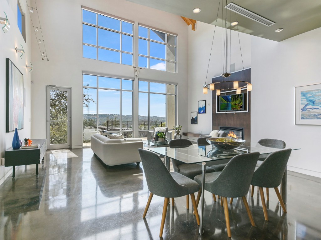 4802 Ranch Road 2222 Austin, TX 78731 - Photo 1 of 1 a view of a dining room with furniture and wooden floor
