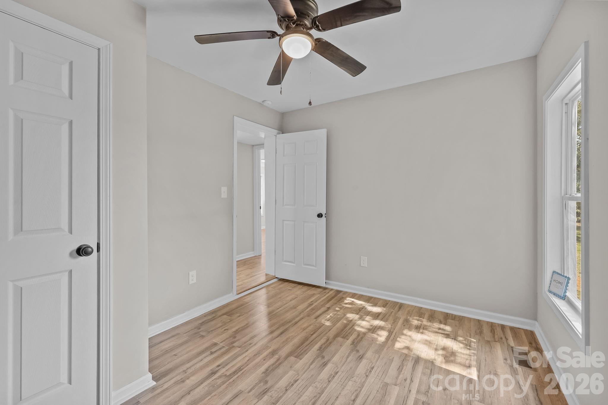 1315 King Road Salisbury, NC 28146 - Photo 21 of 41 a view of empty room with wooden floor