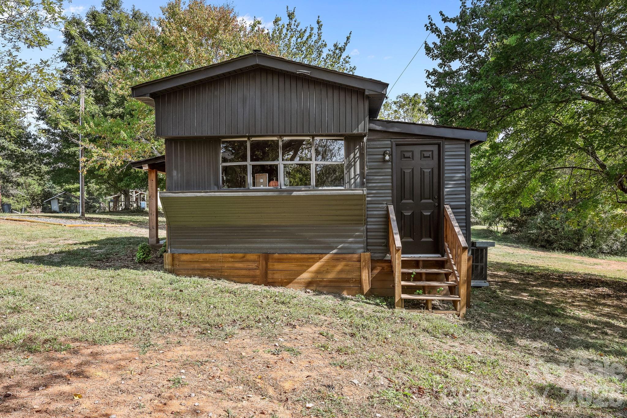 1315 King Road Salisbury, NC 28146 - Photo 27 of 41 a front view of a house with a yard