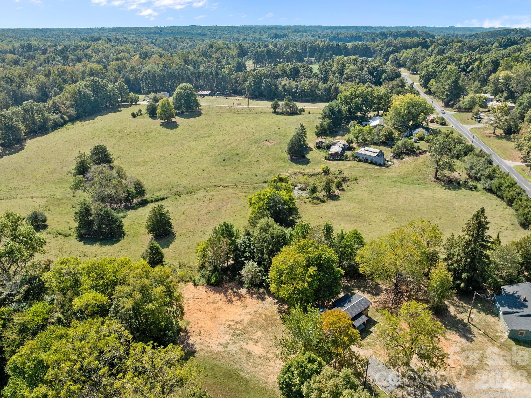 1315 King Road Salisbury, NC 28146 - Photo 31 of 41 a view of a lake with a mountain