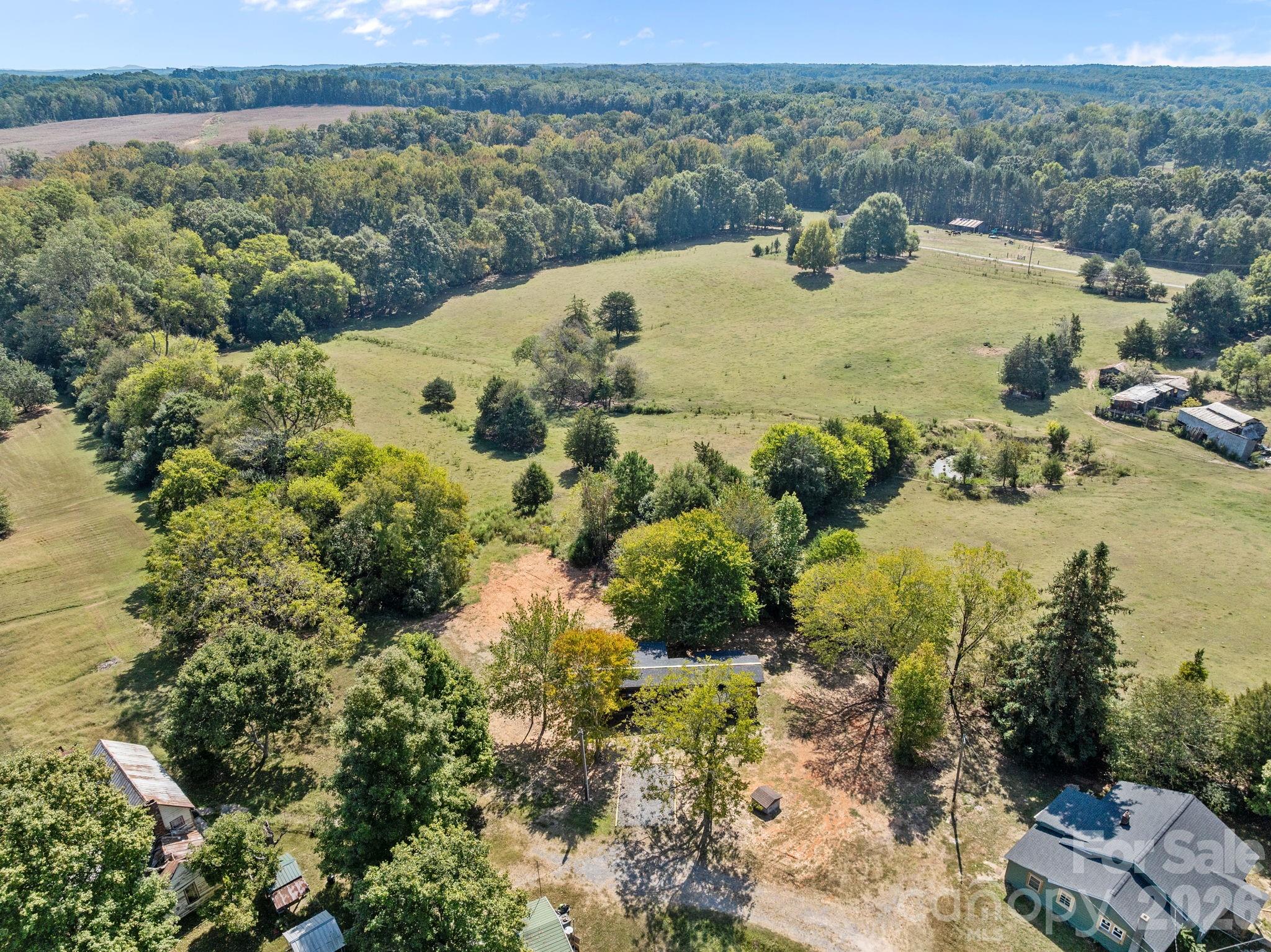 1315 King Road Salisbury, NC 28146 - Photo 32 of 41 a view of a lake with a mountain