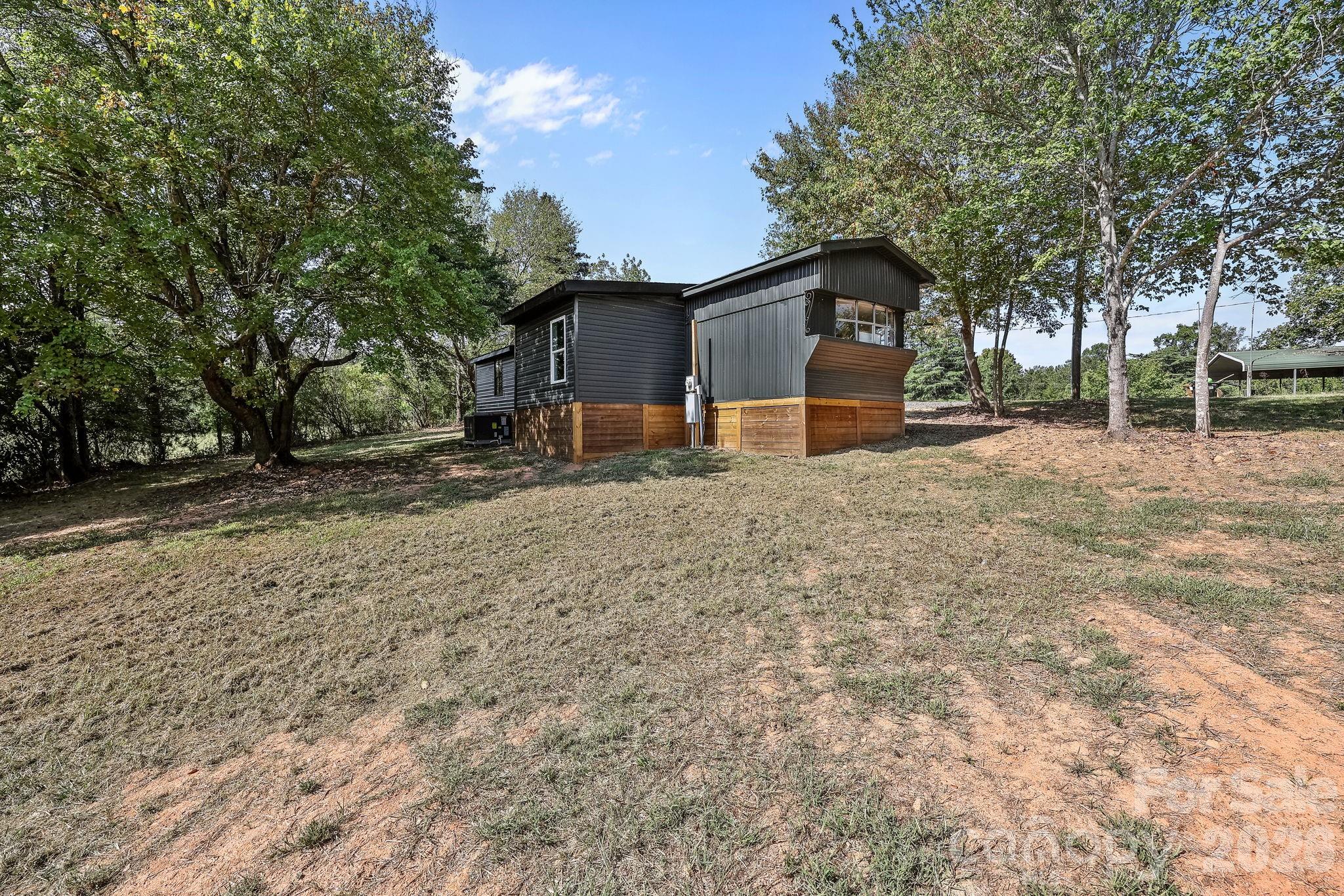 1315 King Road Salisbury, NC 28146 - Photo 38 of 41 a dirt road with large trees