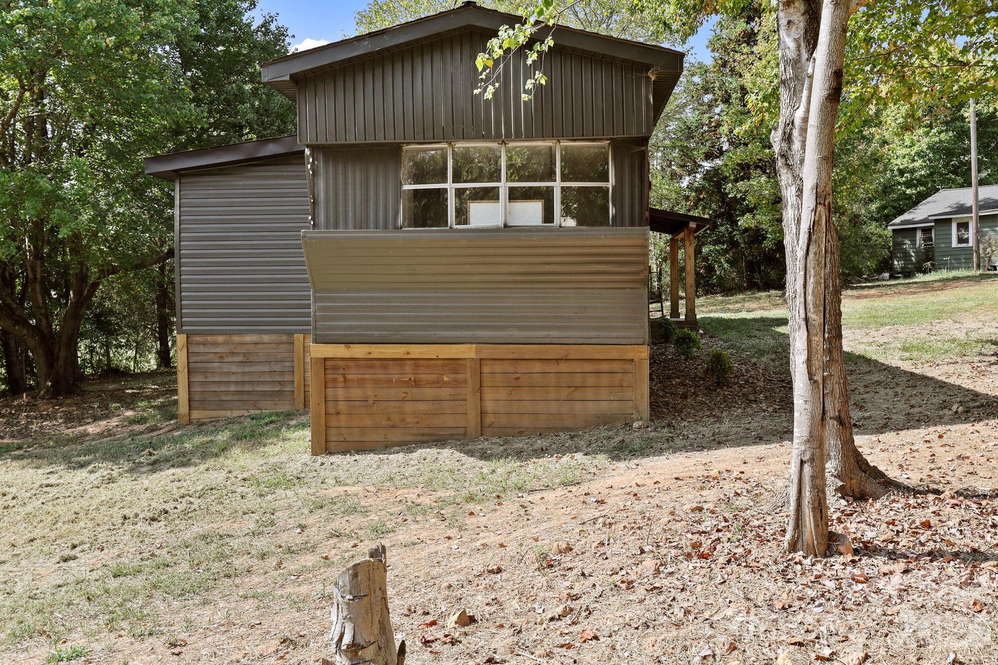 1315 King Road Salisbury, NC 28146 - Photo 39 of 41 a front view of a house with a yard