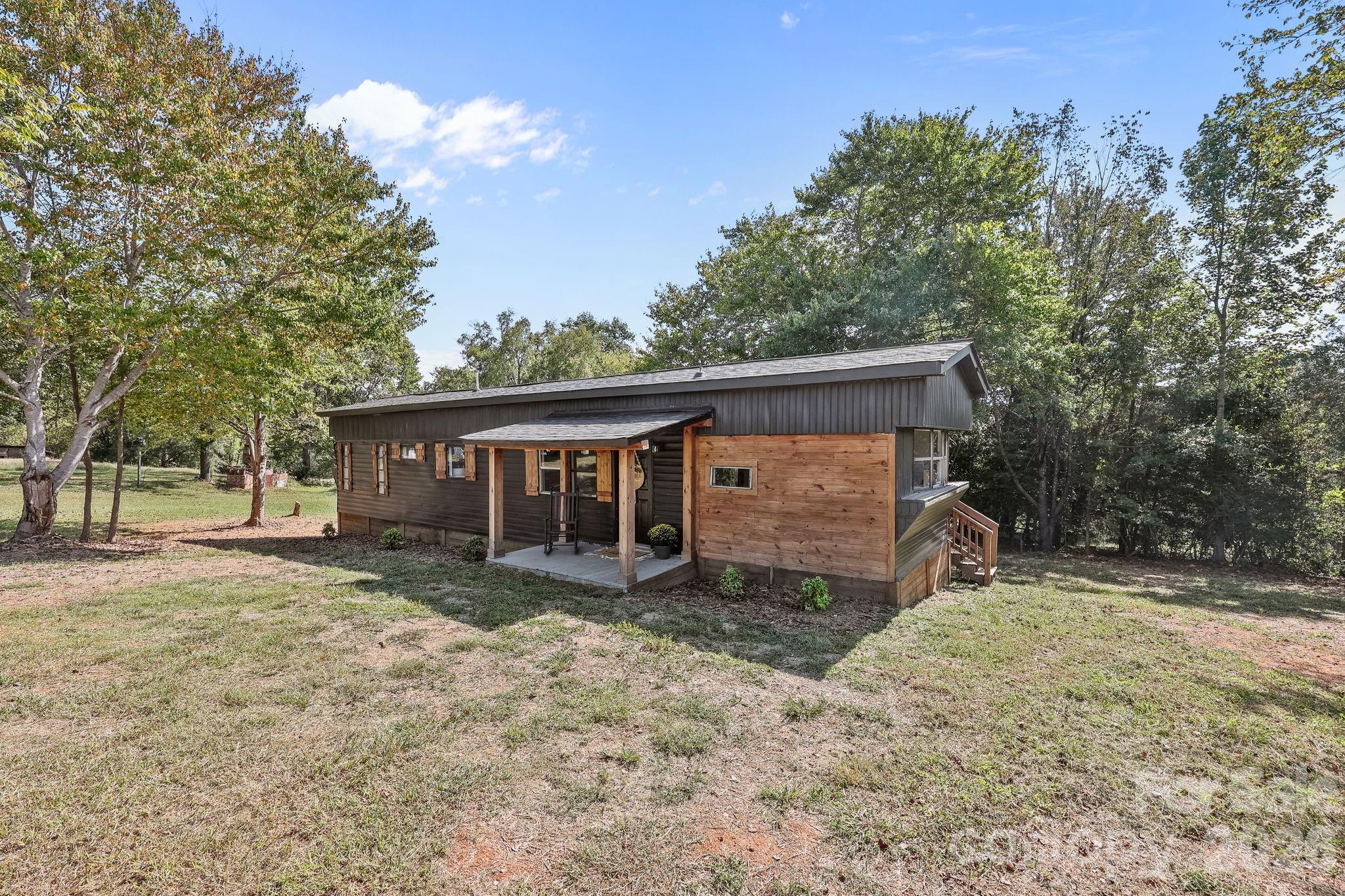 1315 King Road Salisbury, NC 28146 - Photo 5 of 41 front view of a house with a yard