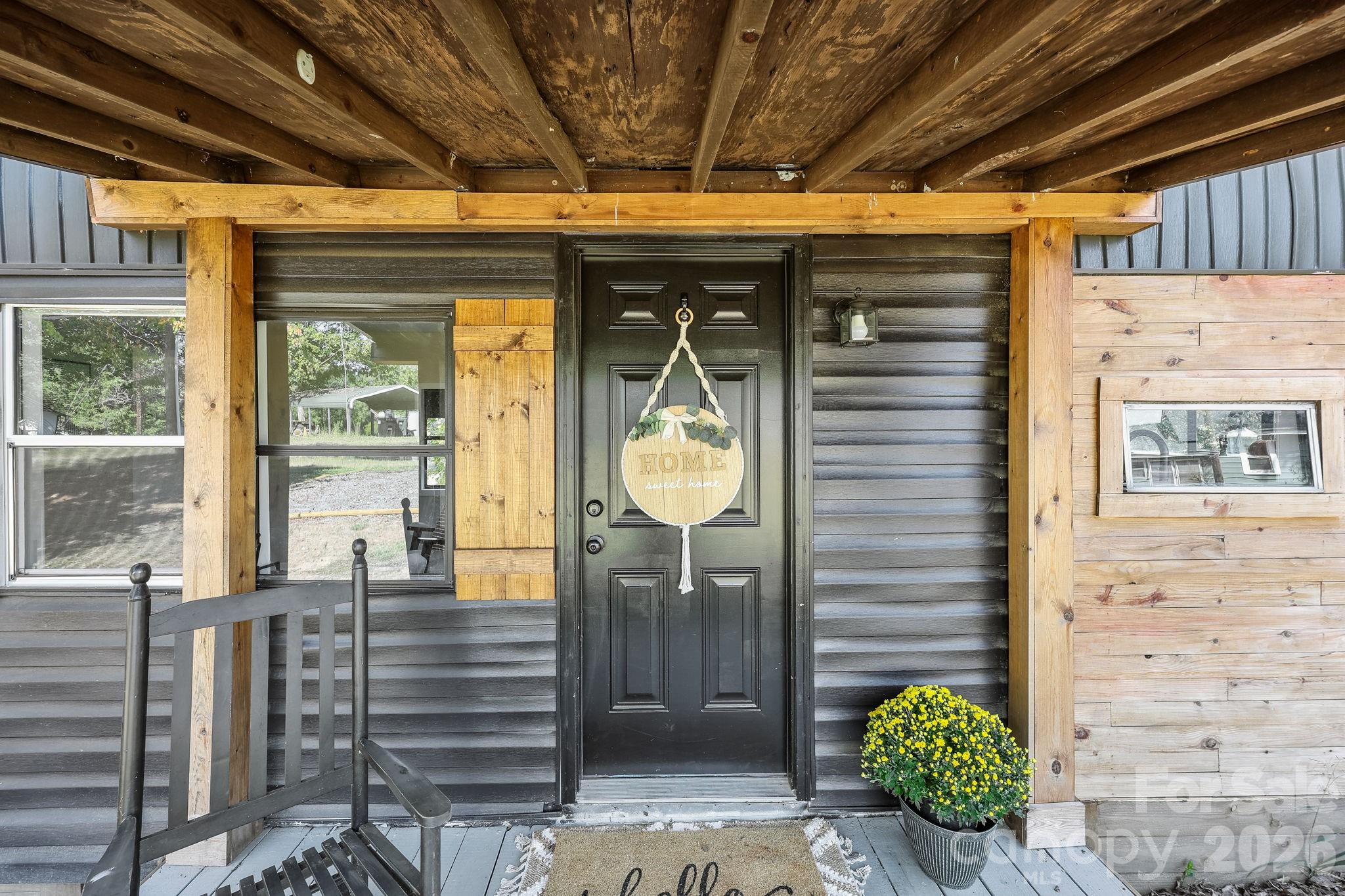 1315 King Road Salisbury, NC 28146 - Photo 7 of 41 a front view of a house with a wooden floor