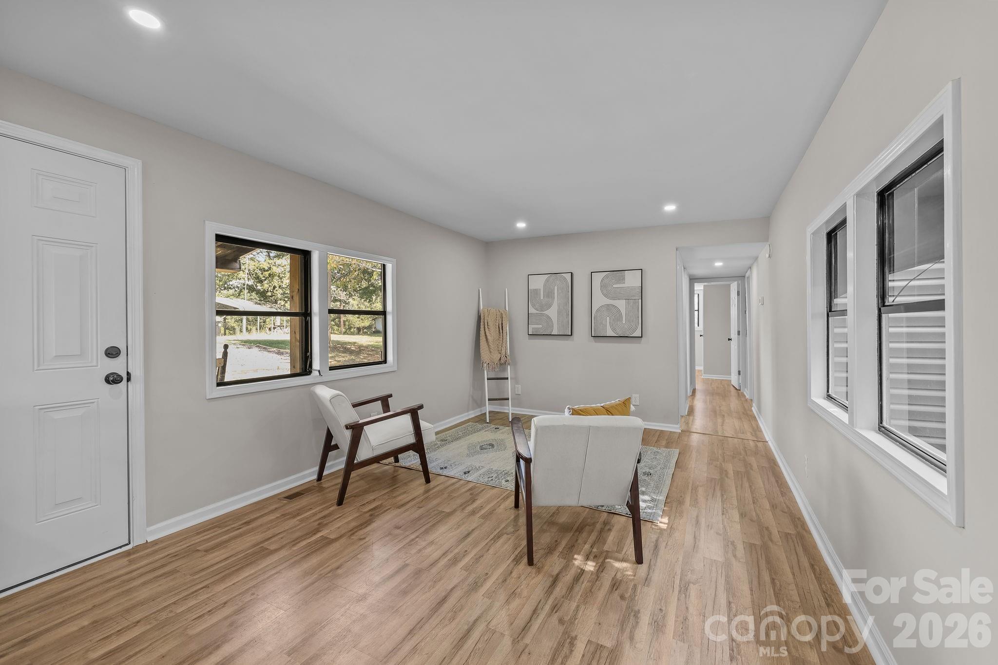 1315 King Road Salisbury, NC 28146 - Photo 10 of 41 a view of a livingroom with furniture and wooden floor
