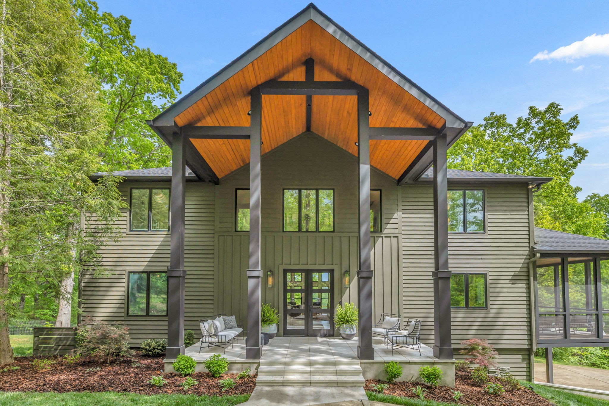 8548 Cub Creek Road Nashville, TN 37209 - Photo 1 of 43 a front view of a house with garden