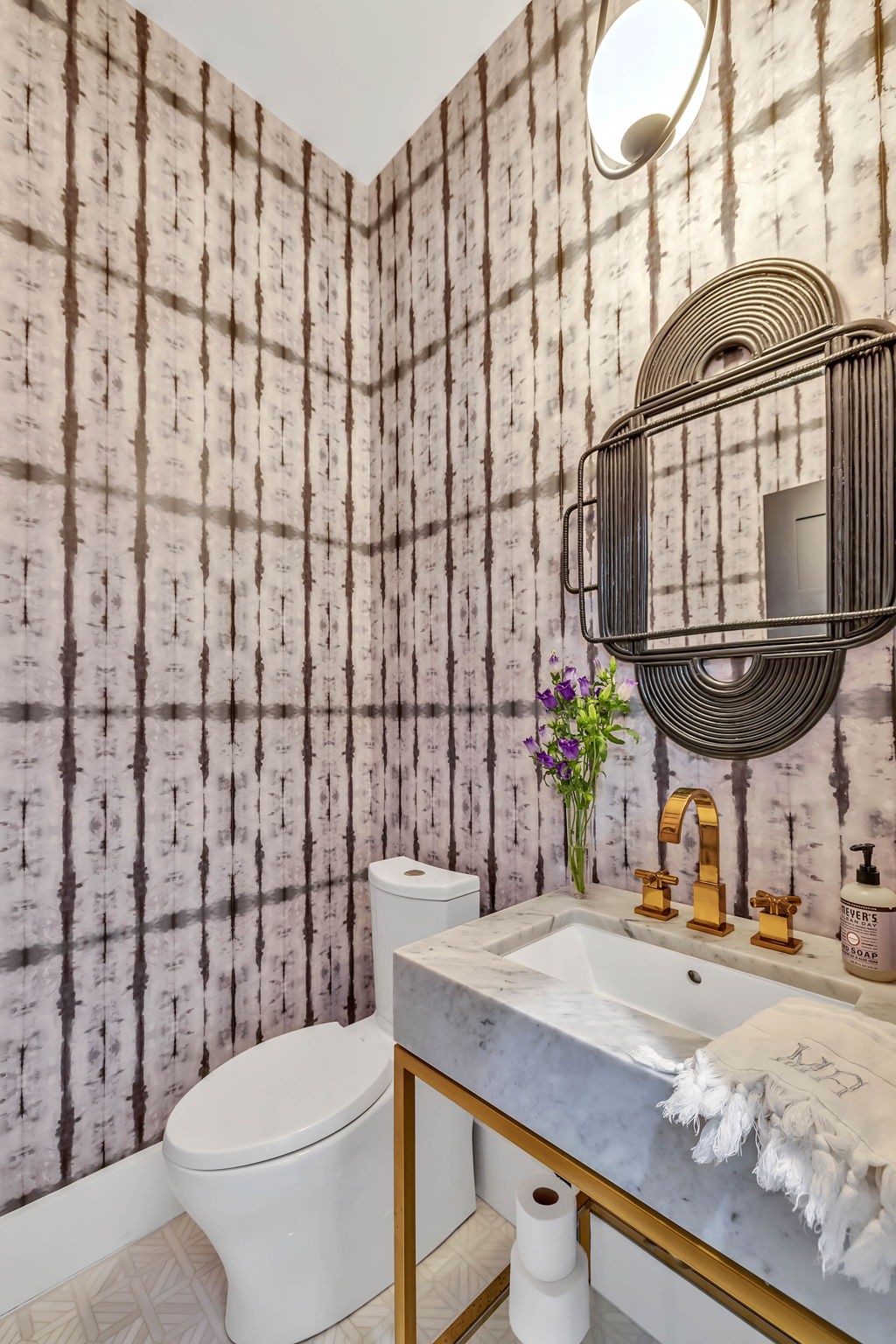8548 Cub Creek Road Nashville, TN 37209 - Photo 15 of 43 a bathroom with a sink a toilet and shower curtain