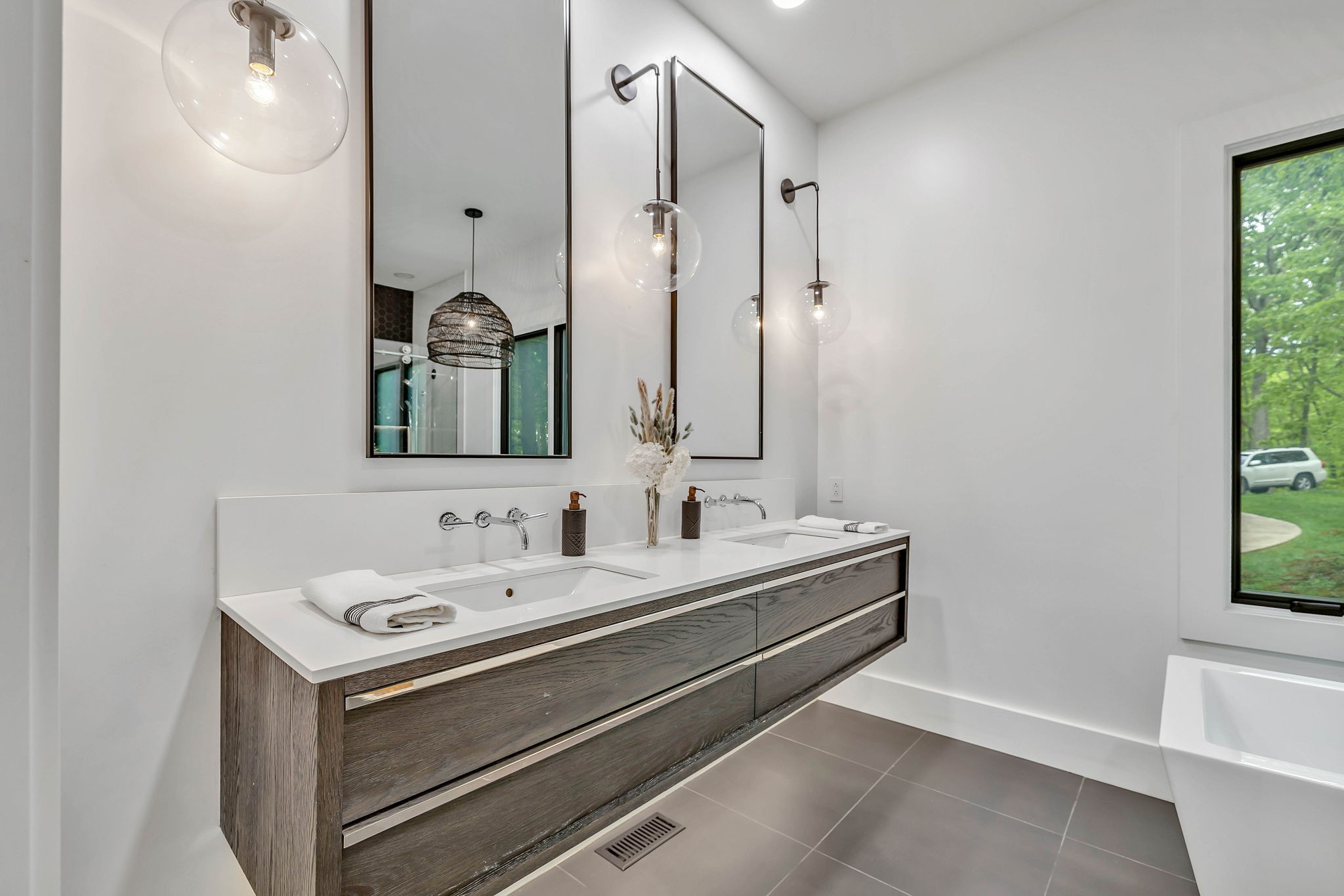 8548 Cub Creek Road Nashville, TN 37209 - Photo 18 of 43 a bathroom with a sink and a mirror