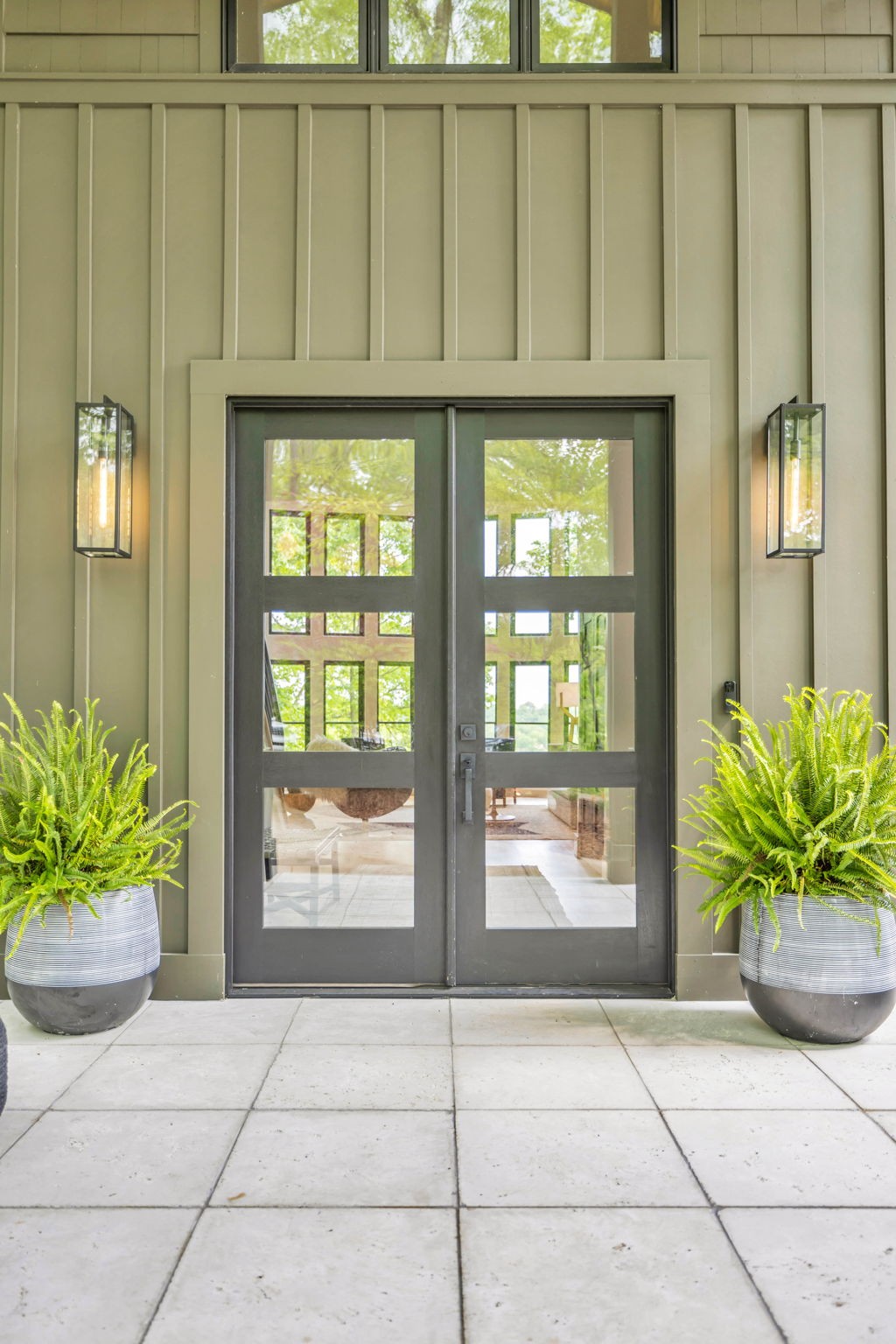 8548 Cub Creek Road Nashville, TN 37209 - Photo 2 of 43 a potted plant sitting in front of a door