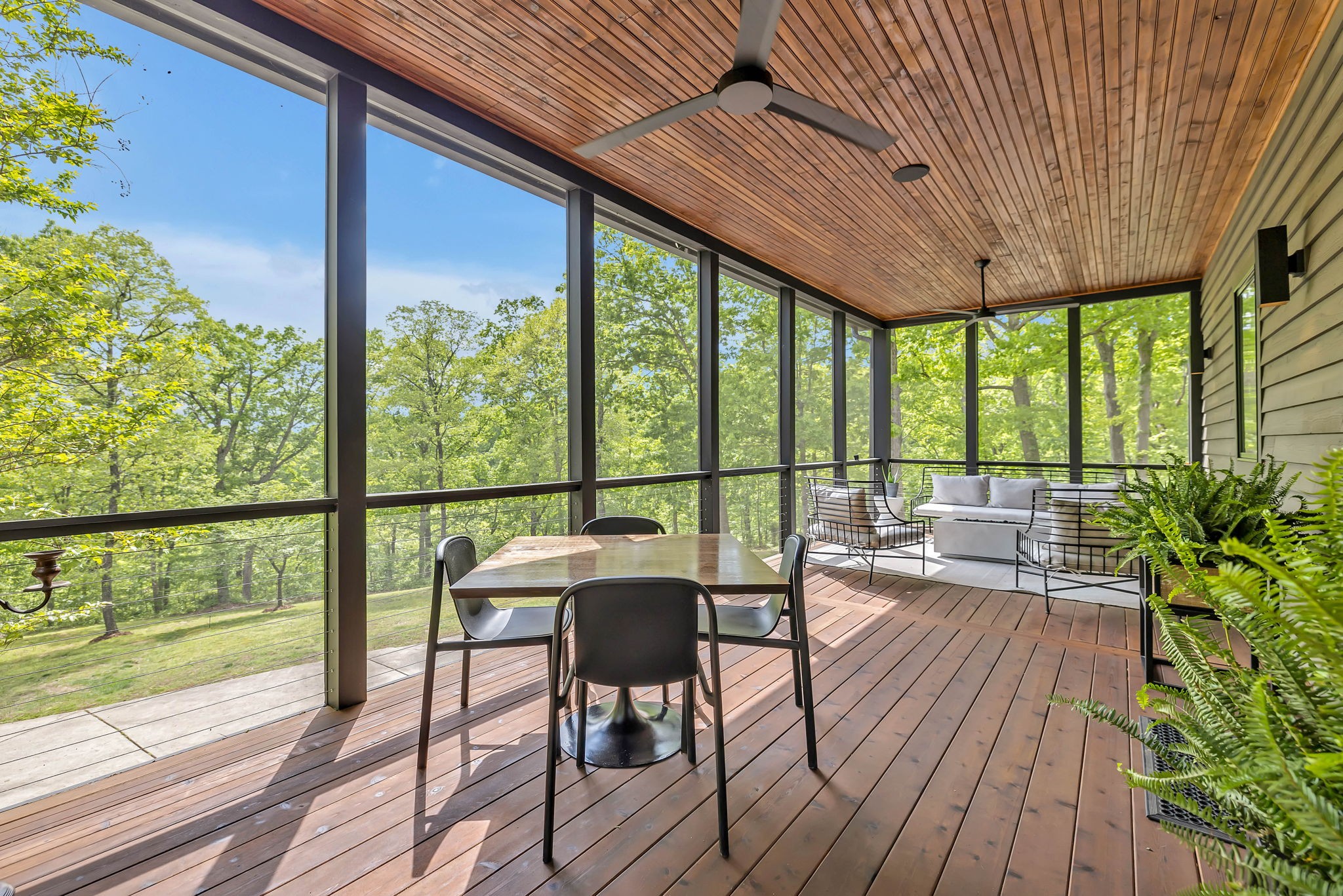 8548 Cub Creek Road Nashville, TN 37209 - Photo 35 of 43 a balcony with furniture and wooden floor