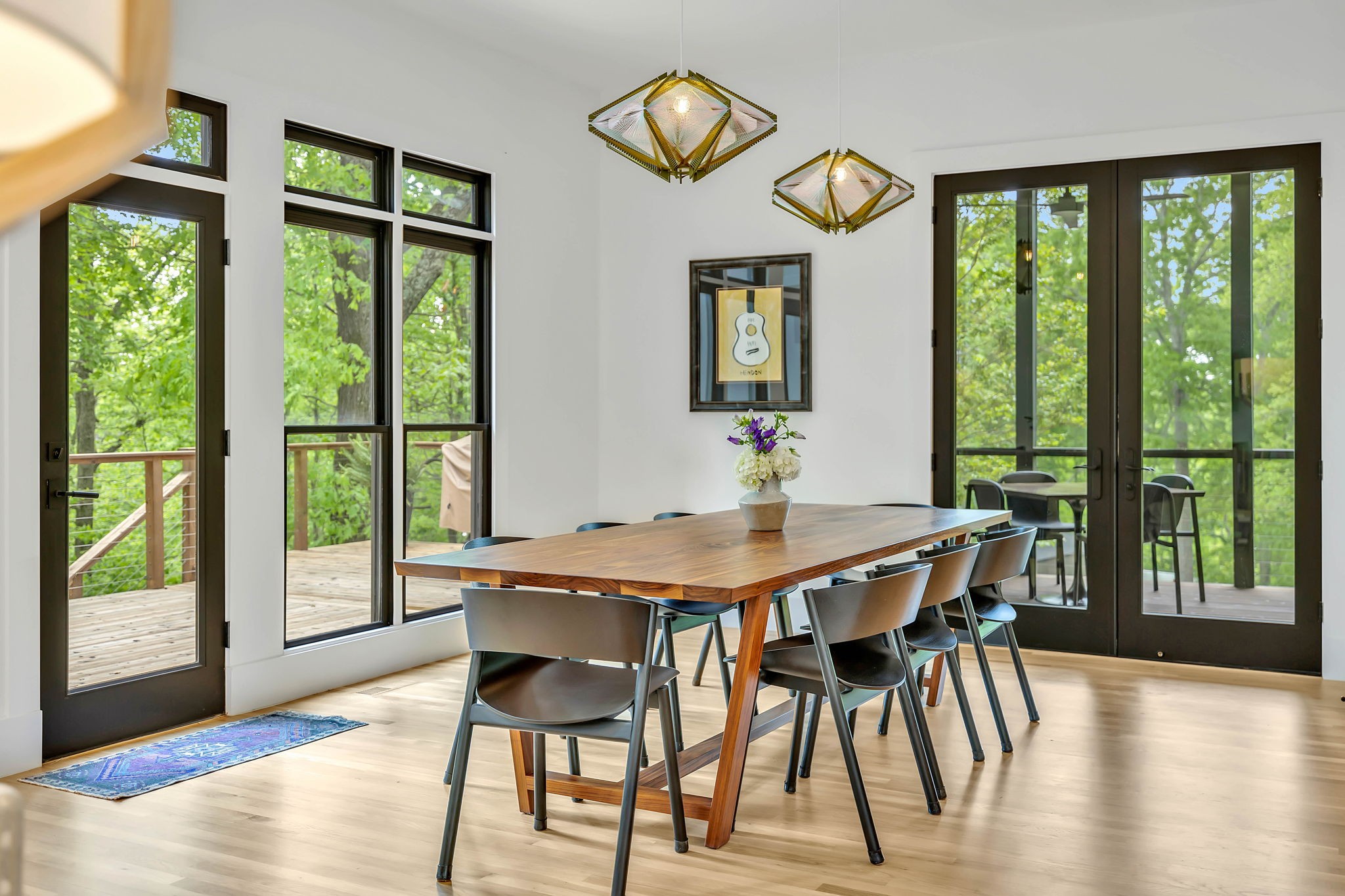 8548 Cub Creek Road Nashville, TN 37209 - Photo 7 of 43 a view of a dining room with furniture window and wooden floor