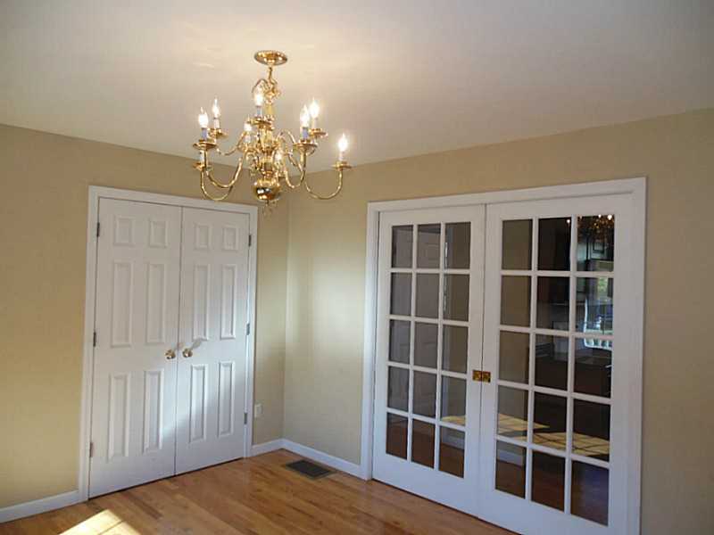 17 Gallup Street Westerly, RI 02891 - Photo 8 of 19 Dining Room. Formal dining room attached to kitchen with beautiful french doors.