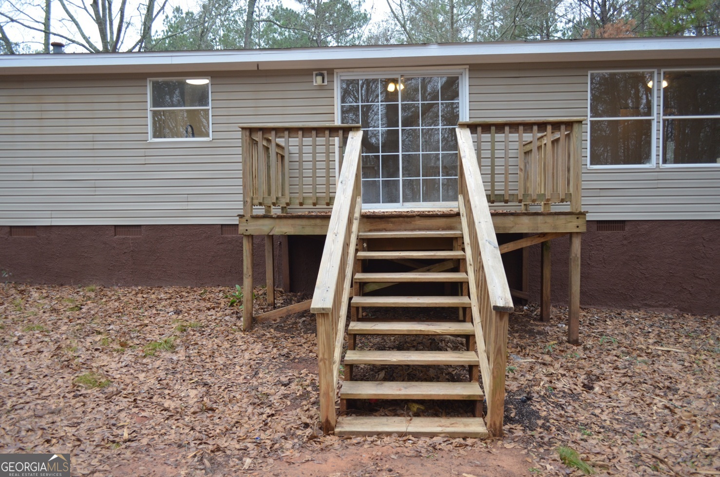 1048 Lee King Road Forsyth, GA 31029 - Photo 16 of 19 a front view of a house with a window