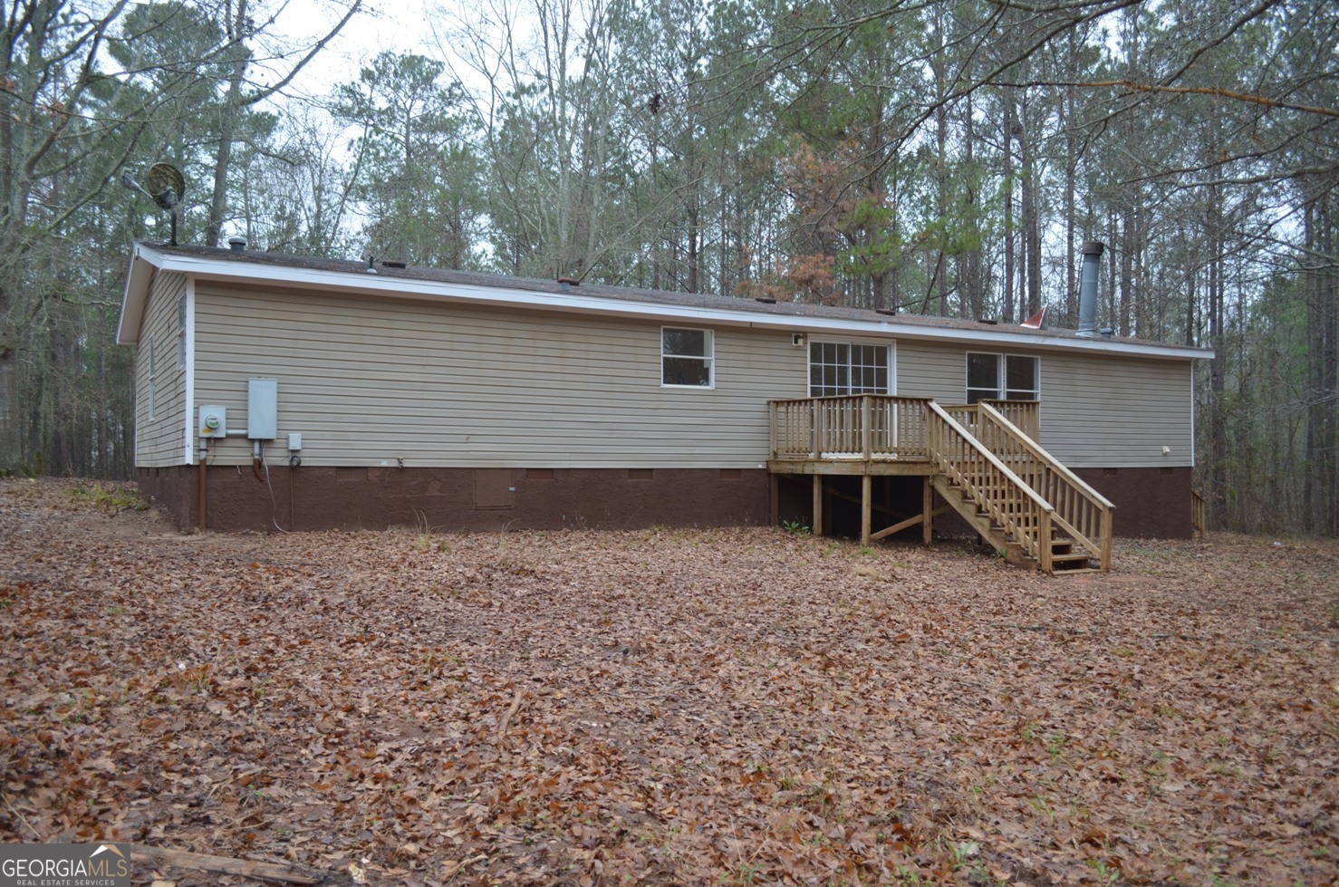 1048 Lee King Road Forsyth, GA 31029 - Photo 17 of 19 front view of house with a yard