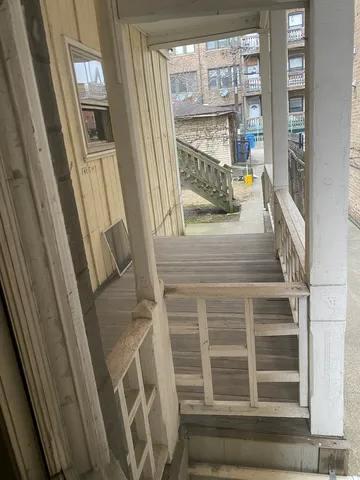 a view of a car park in front of house