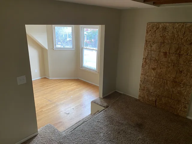 an empty room with windows