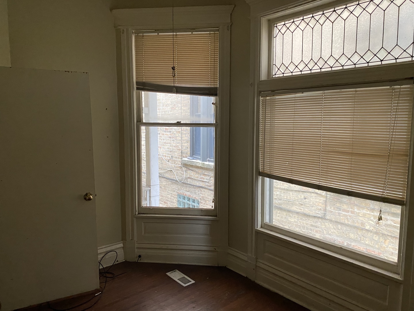 1522 West Wilson Avenue Chicago, IL 60640 - Photo 7 of 27 a view of an empty room with a window