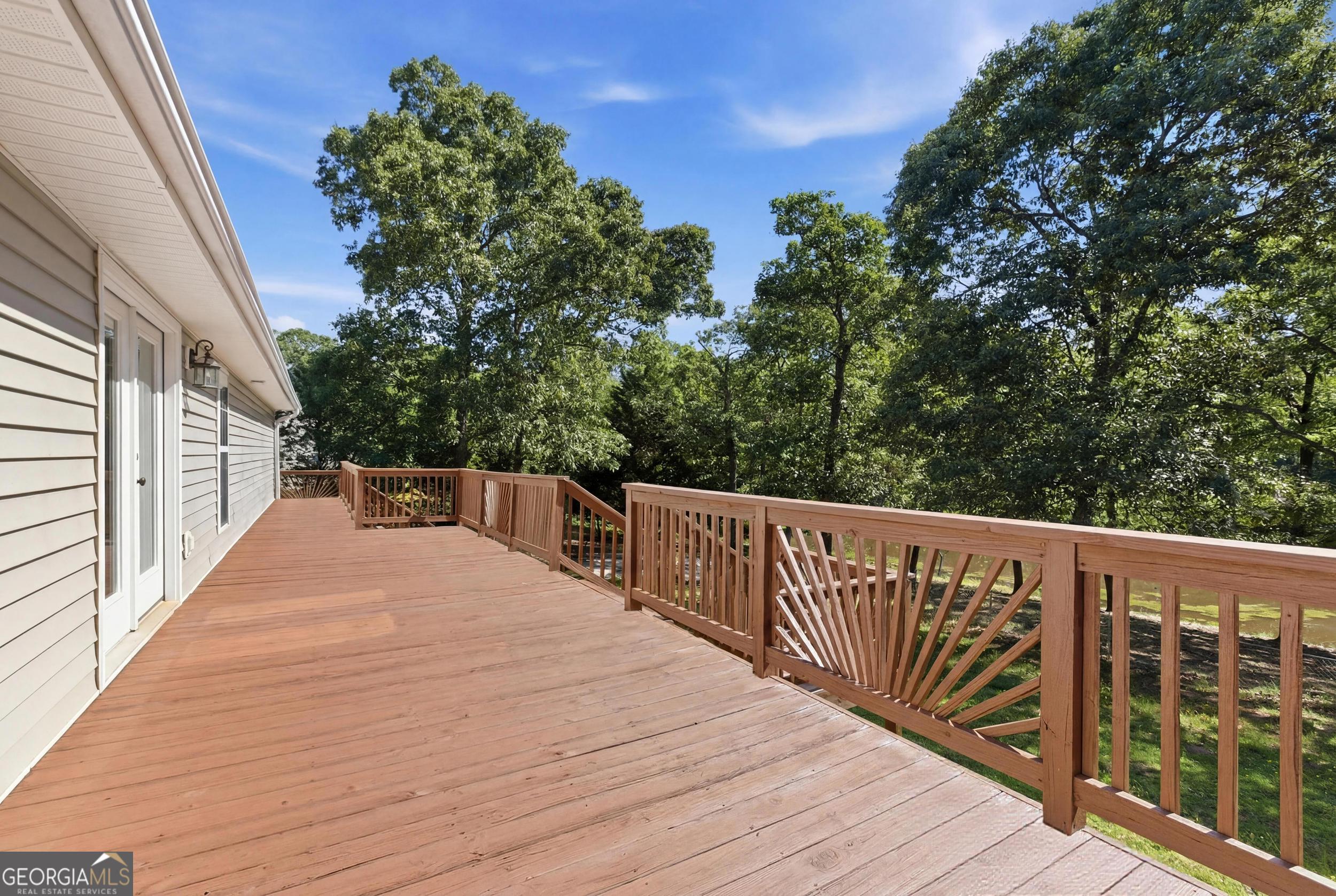 171 Winding Way Hartwell, GA 30643 - Photo 12 of 37 a view of balcony with wooden floor and fence