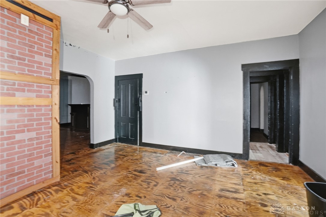 517 Broadway Street, Unit 515 Springfield, OH 45504 - Photo 8 of 29 This bright space features unique wood flooring and a classic ceiling fan, ready for your personal touch.
