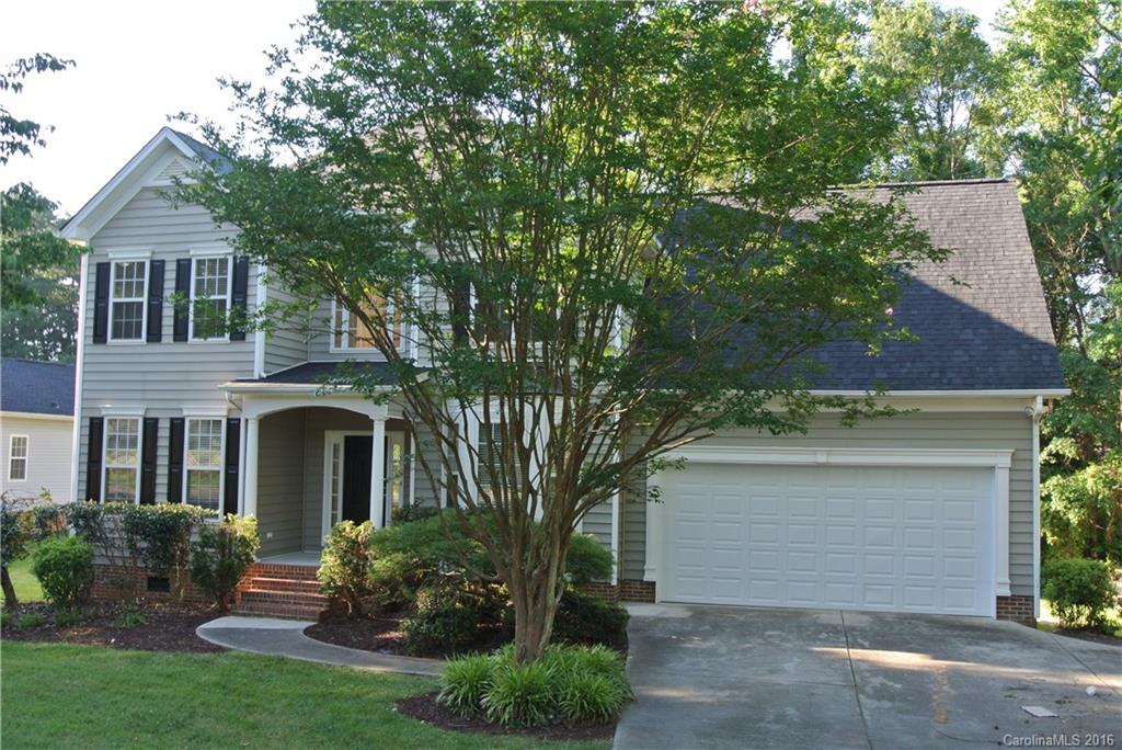 10100 White Cascade Drive Charlotte, NC 28269 - Photo 2 of 19 front view of a house with a yard