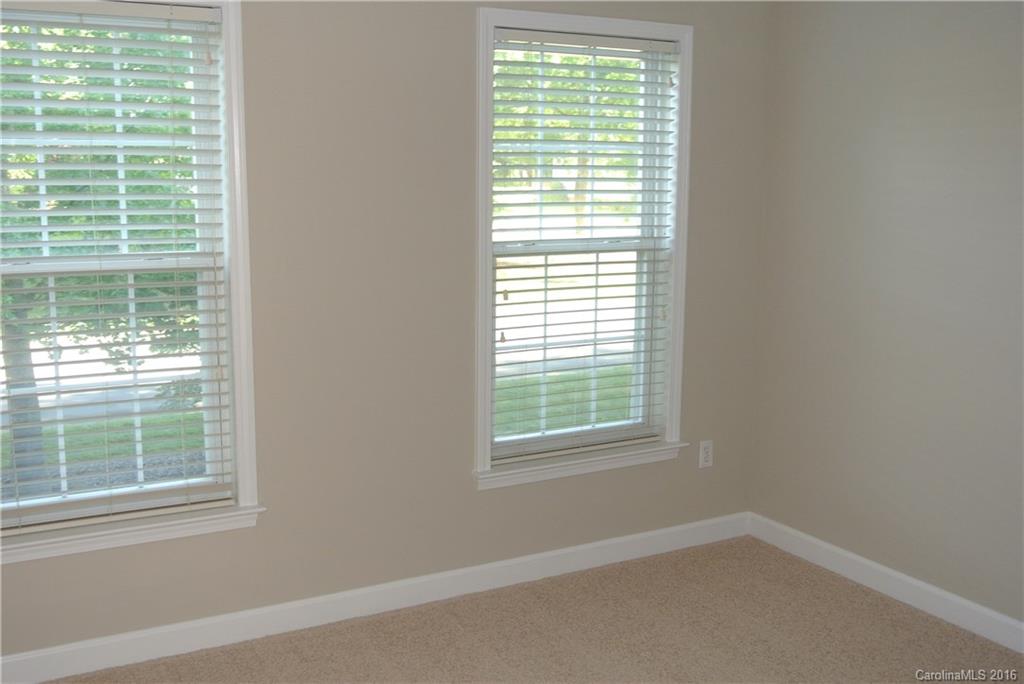 10100 White Cascade Drive Charlotte, NC 28269 - Photo 14 of 19 a view of an empty room with a window