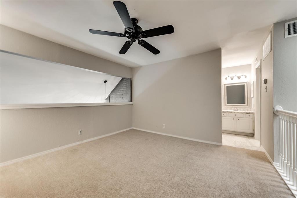 18240 Midway Road, Unit 302 Dallas, TX 75287 - Photo 16 of 33 a view of a room with a ceiling fan