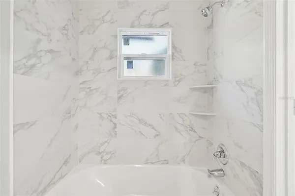 a bathroom with a bathtub
